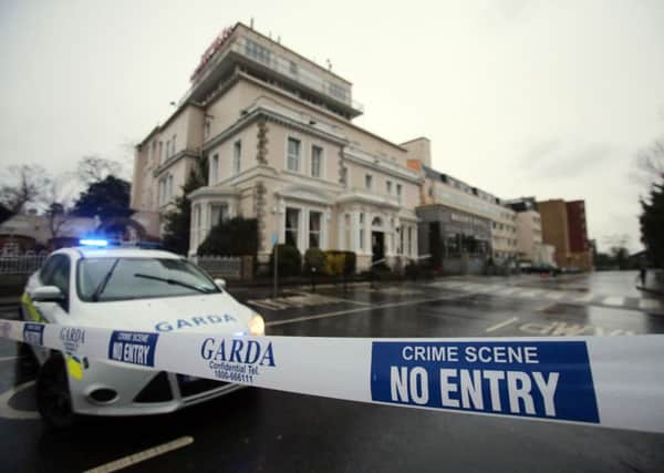 A Garda cordon outside the Regency Hotel in February. Photo credit should read: Niall Carson/PA Wire