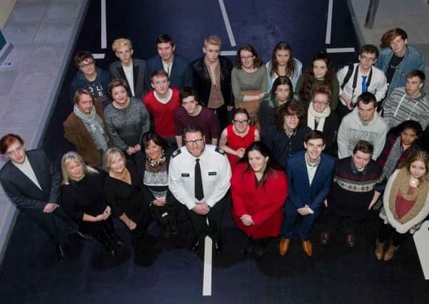ACC Stephen Martin, Justice Minister Claire Sugden, Northern Ireland Policing Board Chair Anne Connolly and PSNI Head of Cooperate Communication Liz Young with SERC students who created the #SoberingMoment videos.