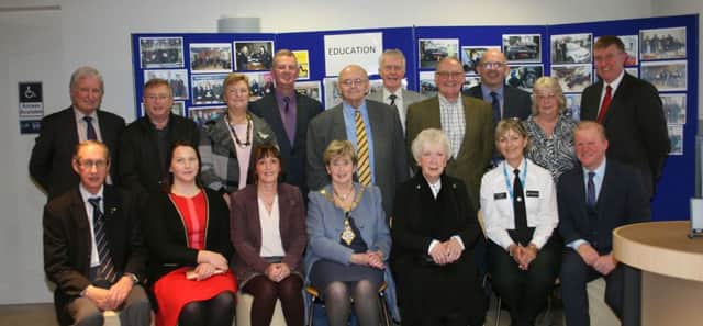 Chief guests at the official opening of Ballymoney Road Safety Committee's 50 year anniversary exhibition in the Town Hall. Included are the Mayor of Causeway Coast and Glens Council, Alderman Maura Hickey, North Antrim MLA, Mervyn Storey, Inspector Rosie Leech, Road Policy Development PSNI, the Lord Lieutenant of County Antrim, Mrs. Joan Christie, chair of Ballymoney RSC, Tom McKeown, founding and current committee members of the committee.