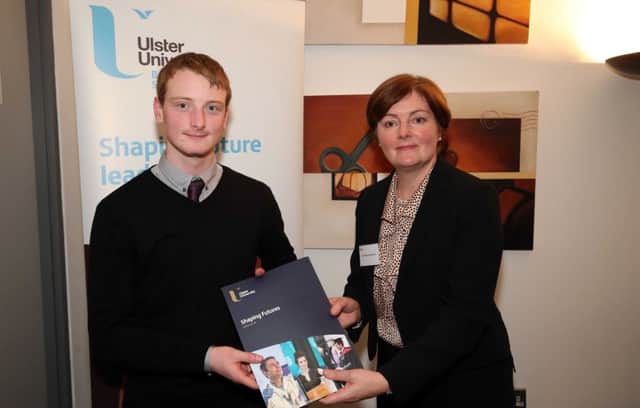 Eoin McKillop is presented with the Alumni Fund Award by Professor Gillian Armstrong.