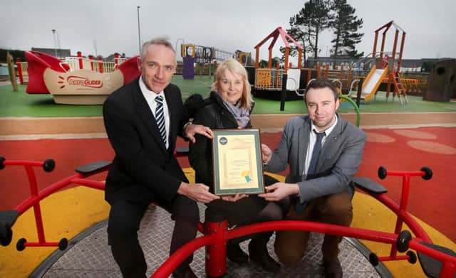 John Richardson, Head of Infrastructure, Wendy McCullough, Head of Sport and Wellbeing and Wayne John Richardson, Head of Infrastructure, Wendy McCullough, Head of Sport and Wellbeing and Wayne Hall, Designer & Project Manager, display the award in the Diversity Park in Portstewart.PICTURE KEVIN MCAULEY/MCAULEY MULTIMEDIA
3