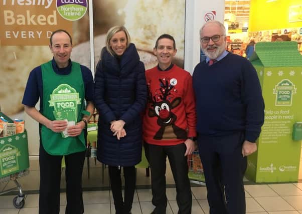 Staff and management at Tesco store Portadown with MLA Carla Lockhart
