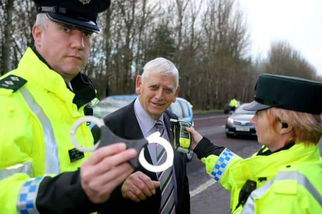 Alderman William King, chairperson of Causeway Coast and Glens Policing and Community Safety Partnership, with the PSNI as they launch the winter drink drive campaign across the Causeway Coast and Glens in Coleraine.  PICTURE KEVIN MCAULEY/MCAULEY MULTIMEDIA. INCR 50-758-CON