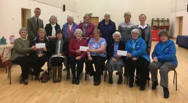 Members of Gracehill Country Market presenting donations to Rev Sarah Groves (centre) from Gracehill Moravian Church and to their other chosen charities Save the Children Fund, represented by Mrs Maureen Chesney and Mrs Irene Hyndman (seated left) and The Alzheimers Society, represented by Mrs Margaret Guirney and Mrs Margaret Turtington. (seated right)
Gracehill Country Markets wish all their customers a very Happy Christmas! (Submitted Picture).