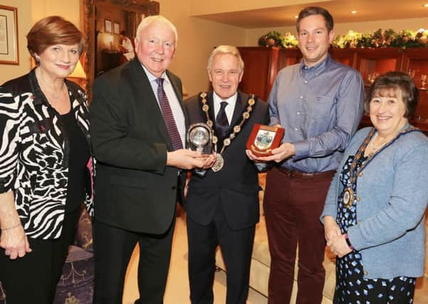 Mayor and Mayoress of Lisburn & Castlereagh City Council congratulate Muriel and David Murphy and son Jonathan on 50 years of David Murphy Towing