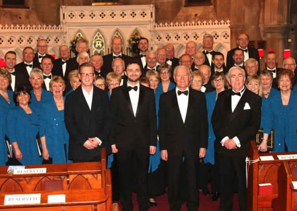 Portadown Ladies and Male Voice Choir at 'Carols from St Mark's', with guests - from left Richard Campbell, accompanist, Mark Tinny, tenor and Drew Rowan, flautist, plus conductor Gordon Speers. INPT50