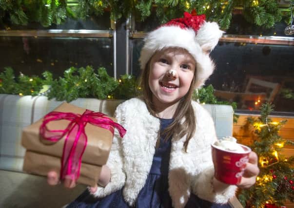 Cara Quinn (6) enjoys delicious hot chocolate. Pick up some festive treats at Lurgan Twilight Market on Thursday 15 and 22 December from 6pm-11pm.