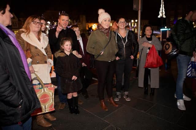 The crowd gather outside Austin's Chrismas windows for the unveiling(Photo - Tom Heaney, nwpresspics)