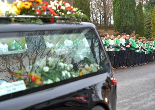 A guard of honour was formed by Fintona Pearse's GAA Club at the funeral of road crash vicitm Maurice McCloughan