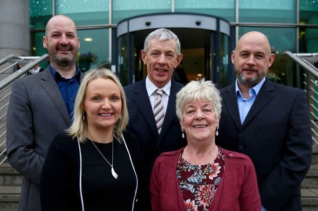 Back row, from left, Andrew McCracken, CEO Community Foundation for Northern Ireland, Michael Hughes, Space & Place, Mark Creaney, Big Lottery Fund;  front,  Claire Russell and Laura Smyth, Irish Street Community and Youth Association. INLS 51-701-CON