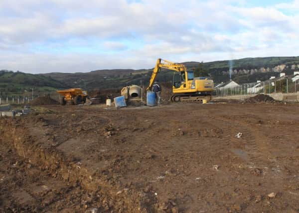 Work gets underway on the new Â£100,000 play park in Carnlough's Croft Road area. INLT-52-700-con