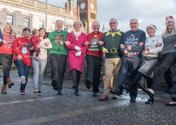 Mayor Alderman HIlary McClintock pictured with Bishop Ken Good and Bishop Donal McKeown and charity representatives at the launch of the Christmas Jumpers Guinness World Record attempt. Pic: Martin McKeown. INLT 51-702-CON