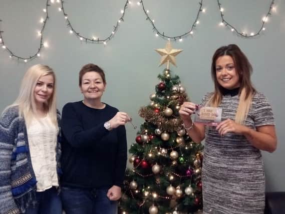 L-R: Simon Community Larne support worker Rebecca White, manager Tracy Millar and support worker Tracey McGrogan. INLT-52-709-con