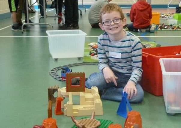 Jason enjoying the Lego workshop organised by the Empower Project in Magherafelt. (submitted picture).