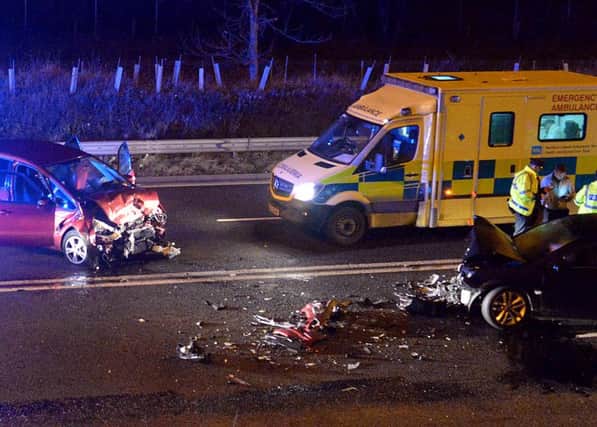 The scene on Northway on Thursday evening where two cars were involved in a crash. Photo by TONY HENDRON.