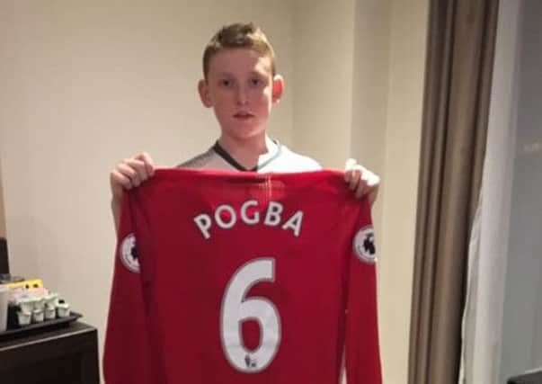 Leon Graham from Ballymena received an early Christmas present from Man Utd player Paul Pogba. INBT 51 leon