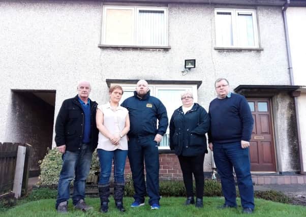 Philip and Therese Corken with Jonathan McMullan (Lisburn SAFE), Trish McCormick (Hilden Community Association) and Cllr Jonathan Craig.