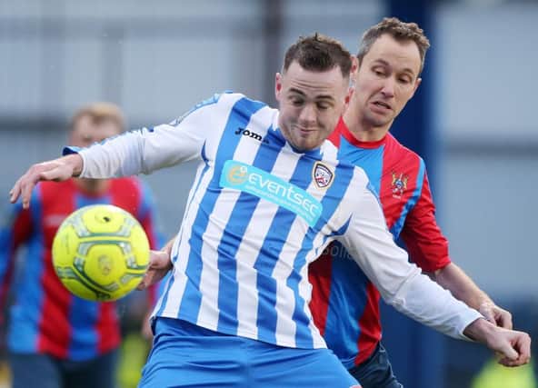 Coleraine's Darren McCauley with Ards' David McCullough
Picture by Jonathan Porter/Press Eye.