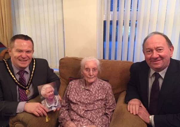 Deputy Lord Mayor of Armagh City, Banbridge and Craigavon Borough Council Cllr. Paul Greenfield and DUP Assemblyman William Irwin MLA have visited Mrs Adeline McCauley who celebrated her 100th birthday on Wednesday with family in Markethill.
 
The Deputy Lord Mayor stated, I was especially delighted to call with Mrs McCauley and present her with flowers and to share with her in celebrating this fantastic occasion. Both myself and my colleague William Irwin MLA wished her every blessing for the future and it is very clear that she is cherished so warmly by her family circle and indeed her wide network of friends who called with her throughout the day.