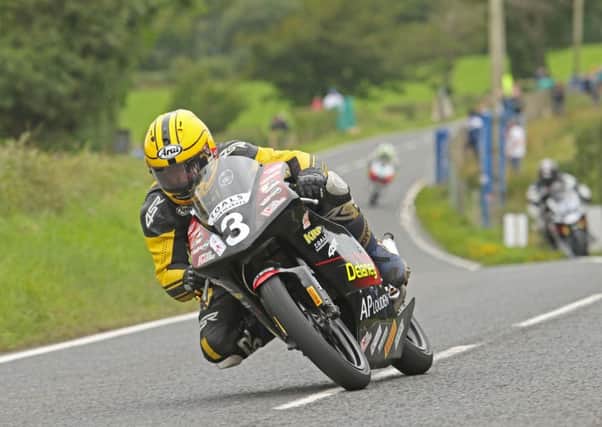 Gary Dunlop in action on the Joey's Bar 125cc Honda at the Ulster Grand Prix.