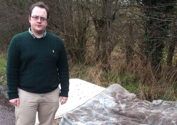 Cllr Alexander Redpath has condemned fly-tipping at Glenavy Road, near Moira.