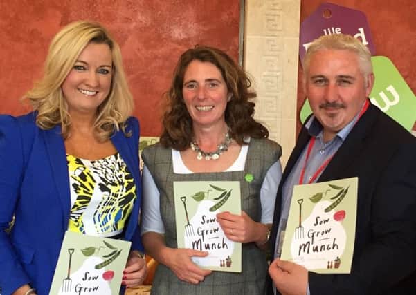 Simon and Jilly Dougan with Jo-Anne Dobson MLA earlier this year at Stormont hosting the launch event for Jillys new Food Educational book  Sow Grow Munch.