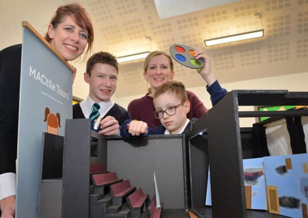 MAC Learning and Participation Officer Clare Lawlor with teacher Mary McLachlan and a pupil from Parkview Special School, Lisburn