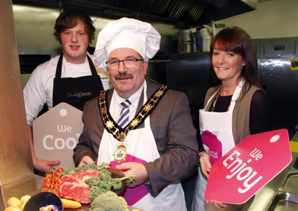 Mayor of Antrim and Newtownabbey, Councillor John Scott, cooks up a real treat with Daniel Harvey (Daniels at Tweedies) and Louise McKinstry (Tourism NI) to launch the WorldHost Food Ambassador Programme.