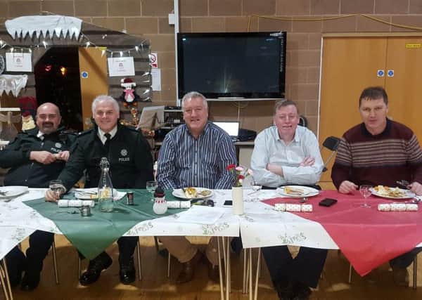 Andrew Patterson and Robert Myers of the Community Policing Team with Cllr Pat Catney, Alderman Paul Porter and Denis Paisley of The Resurgam Trust at the networking dinner.