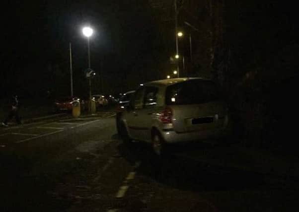 Cars were parked on the footpaths around Ballyclare High School. INNT 02-823CON