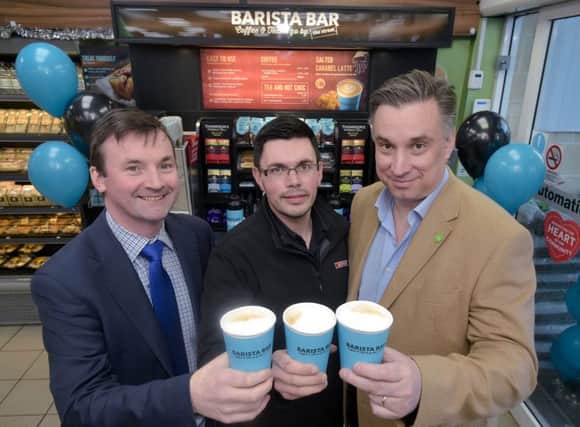 Ronan Gourley, National Sales Manager Ireland, UCC Cofee; David, Store Manager, Milltown SPAR Ballymoney and Mark Stewart-Maunder, Business Development Director, Henderson Foodservice Ltd., pictured at the 250th Barista Bar install and celebrtaing a very successful year for the coffee brand.