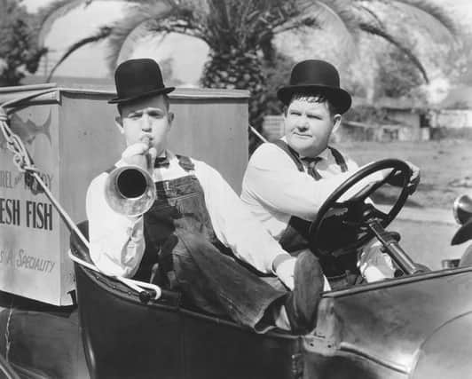Stan Laurel and Oliver Hardy in their classic short Towed in a Hole