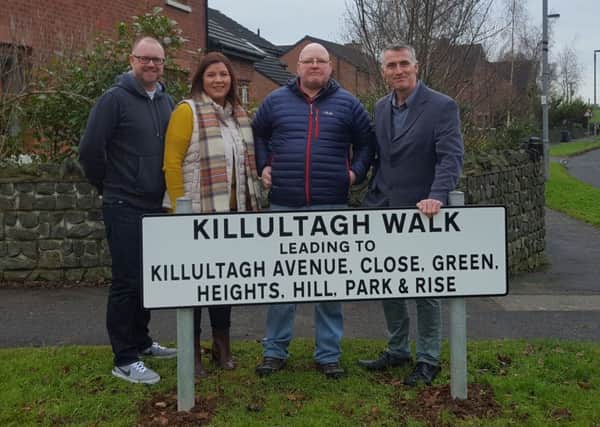 Declan Kearney MLA in the Killultagh estate with local residents.