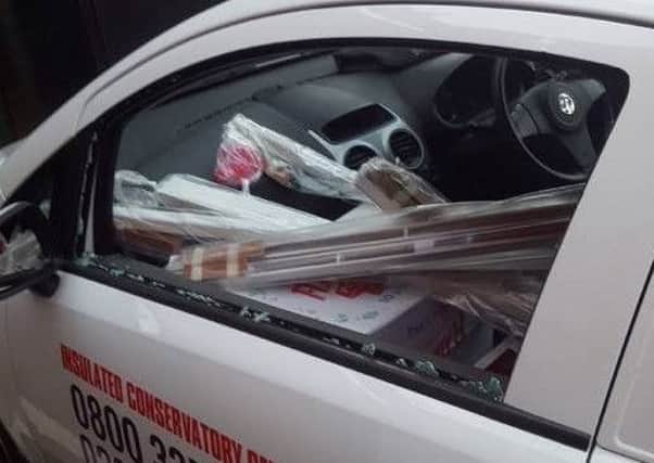 The passenger side window of the car was smashed and a number of tools stolen.