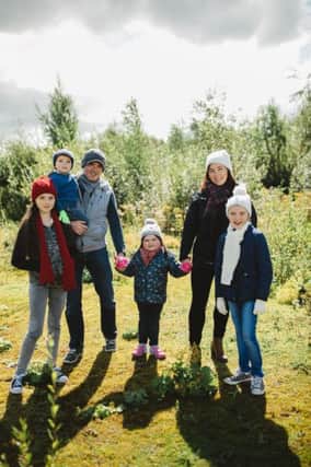 The McGeehan family from County Tyrone are encouraging families from across the country to step out on  February 25 for Cancer Fund for Children's Winter Woolly Walk. The family were supported by Cancer Fund for Children after their daughter/sister Cassie (centre) was diagnosed with a brain tumour in 2010.
