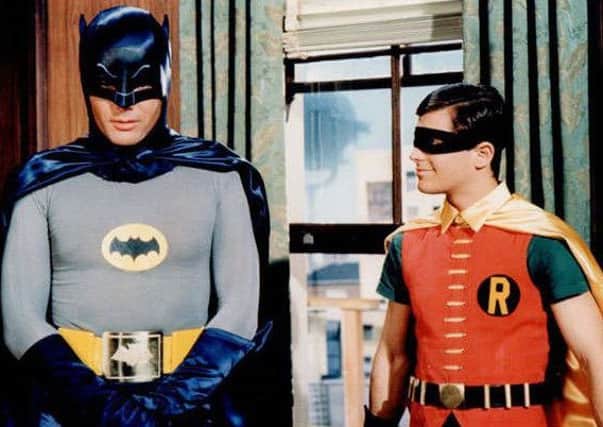 Adam West and Burt Ward as Batman and Robin.