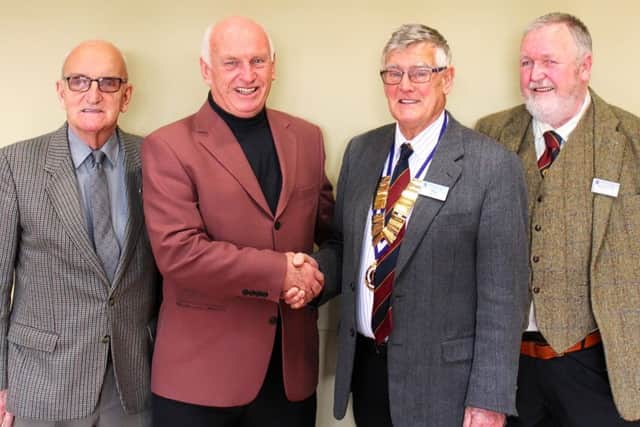 Coleraine Probus President Jim Archer greets John McNally with club members John Graham (L) and Malcolm Hinds (R)