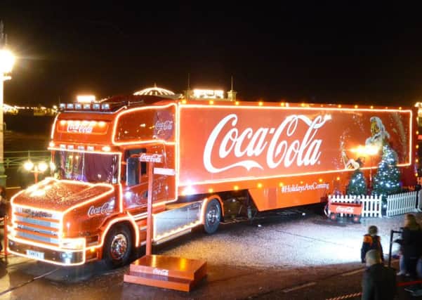 Campaigners want to ban the Coca Cola truck tour because they argue it promotes unhealthy soft drinks.