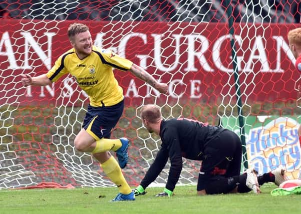 Matthew Hazley - celebrating a goal at Shamrock Park with Dungannon Swifts - will now be playing for Portadown. Pic by PressEye Ltd.