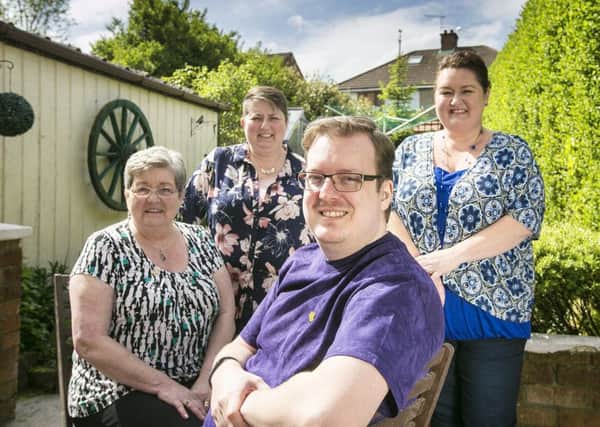 Craig Fisher (33) pictured with his mum Margaret and sisters Amanda Orr and Joanne Taylor.