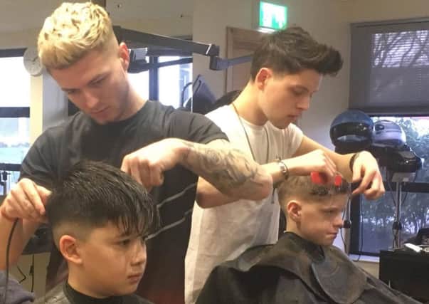 Primary seven boys from Termoncanice P.S. learn about the skills in barbering from students at North West Regional College  in Limavady.