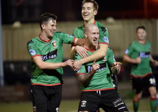 Glentoran's Stephen O'Flynn celebrates after he  fires his side into a 2-0 lead
against Ards.