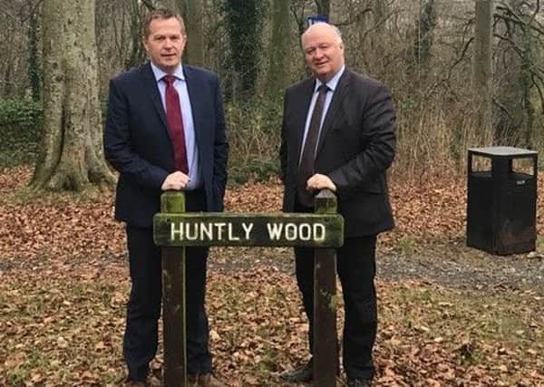 Councillor Paul Greenfield and Upper Bann MP David Simpson have called for urgent action to clean up Huntly  Wood.