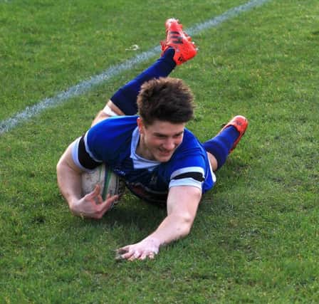 Coleraine's Bokkie Carstens goes over for Coleraine's opening try. Photo by David McDonald