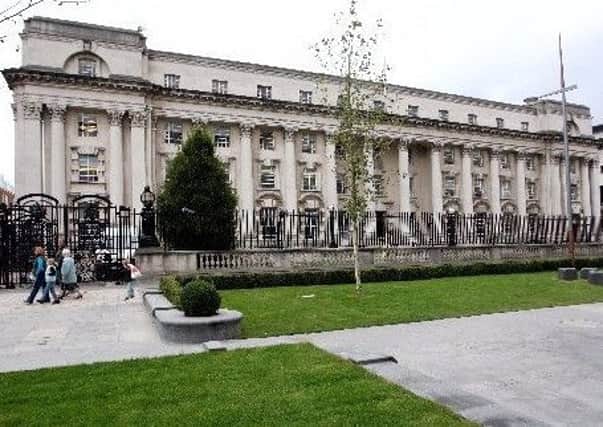Three men who attempted to rob a city centre newsagents have each been handed a four-and-a-half year sentence after appearing at Belfast Crown Court (Picture: Diane Magill)