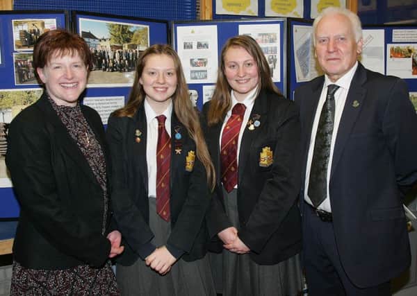 Downshire School hosted the finale of the Heritage Lottery Fund Churchill Tank Project on Friday.Pictured is Mrs Boyd and Mr Kirker with Bethan White and Alex Montgomery, original members of Downshire School's "Tank Team". INCT 04-659-CON