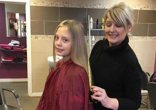 Katie pictured with Jeannie Simpson.