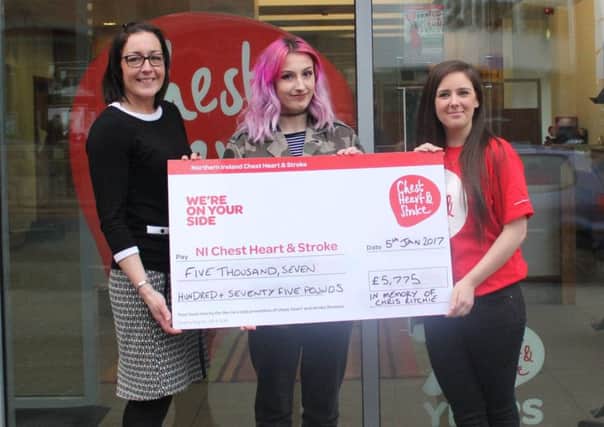 Danielle Algie of NI Chest, Heart and Stroke receives a cheque from Christopher's wife Deborah Ritchie and daughter Jessica Ritchie. INLT-04-704-con