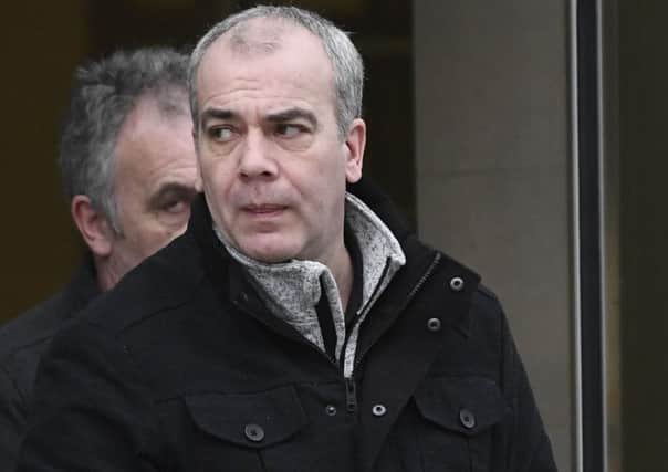 Colin Duffy leaves Belfast Crown Court after Thursdays proceedings