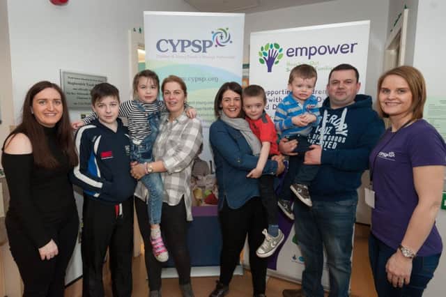 SinÃ©ad Brady of the Empower Project; Conal, Niamh and Karen Craig; Lucia, Conor, FionntÃ¡n and Kieran Boyle; and Sandra Anderson of CYPSP.